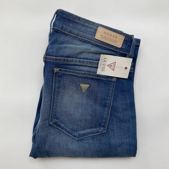 Guess Women’s Low Rise Boot Cut Jeans In Medium Blue Denim Size 27 - Picture 1 of 14